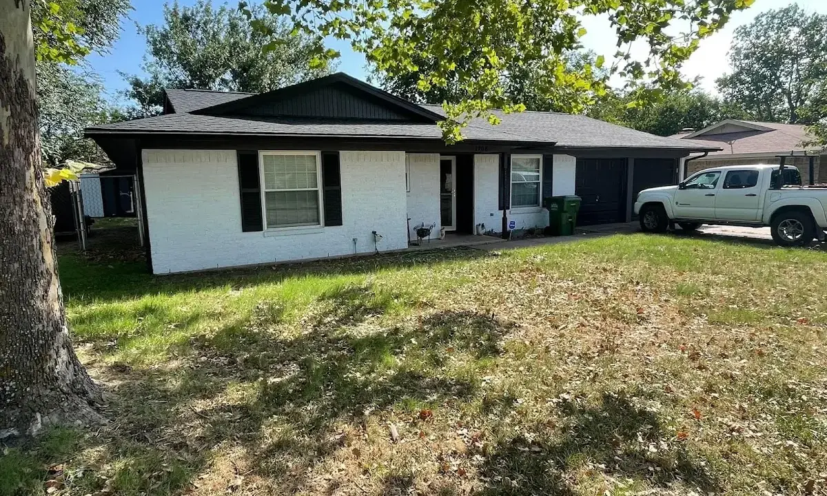 Professional roofing crew working on a residential roof in Gardnerville